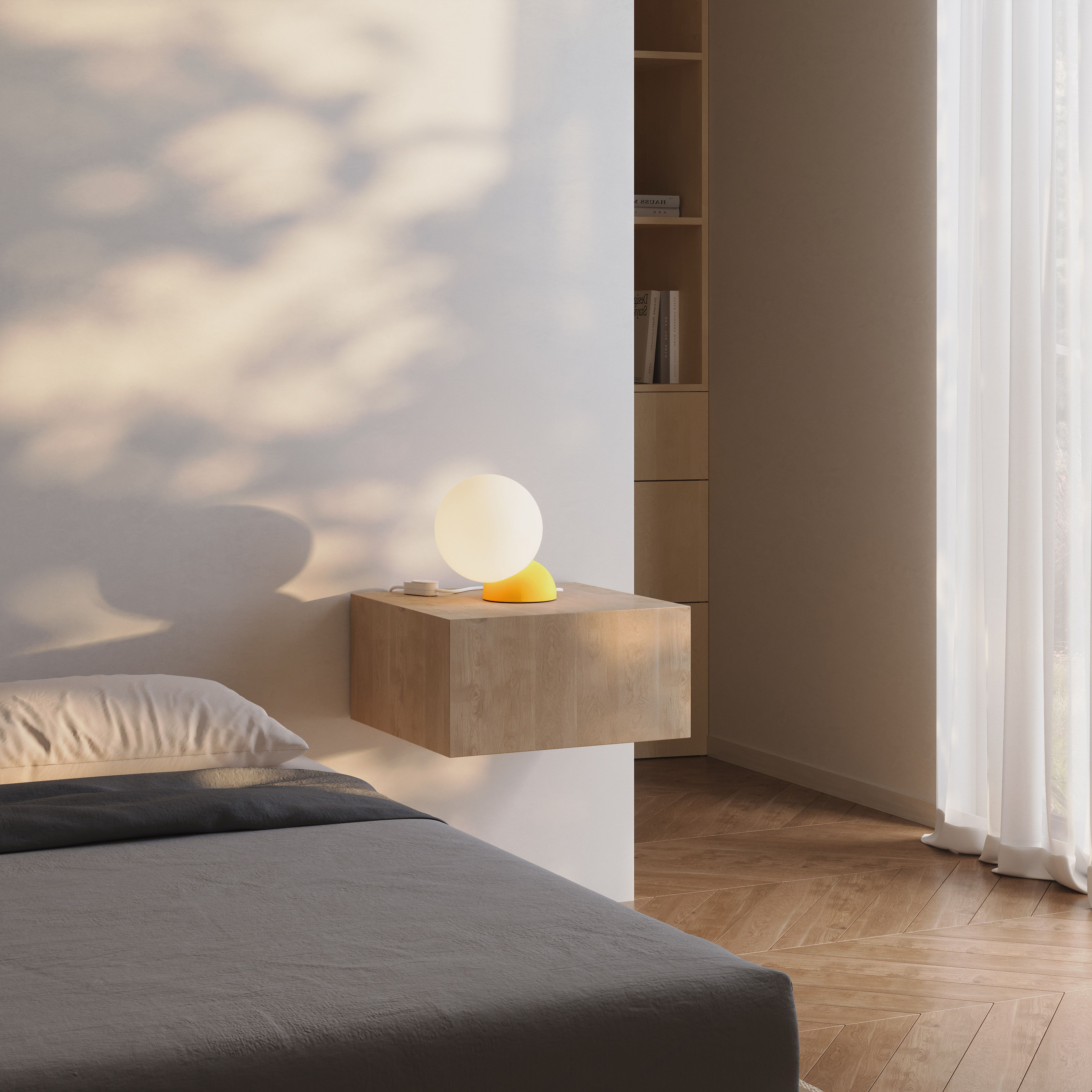 A Gantri Cantilever Lamp on a table.