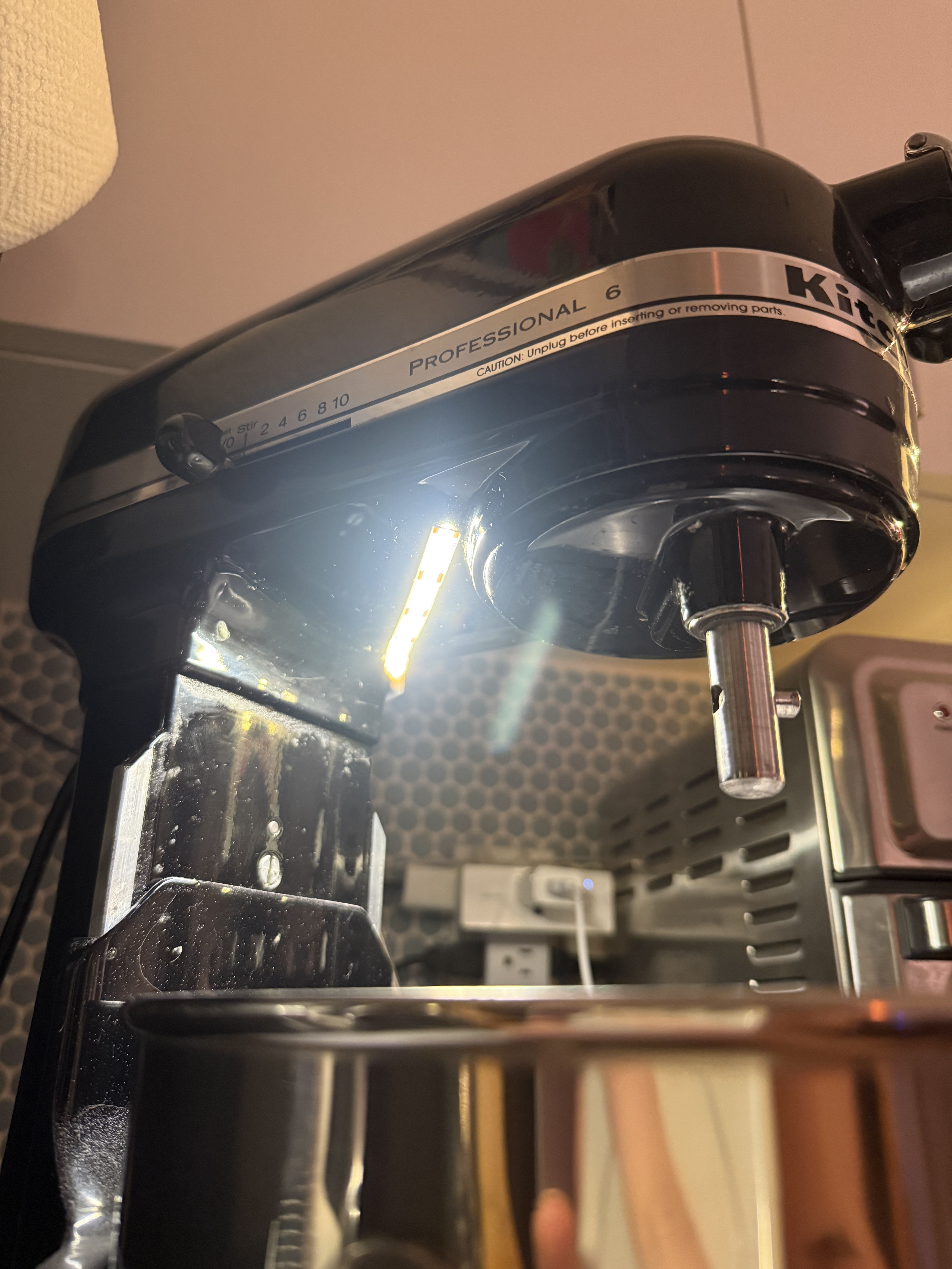 View of a light strip attached to a stand mixer from below. 