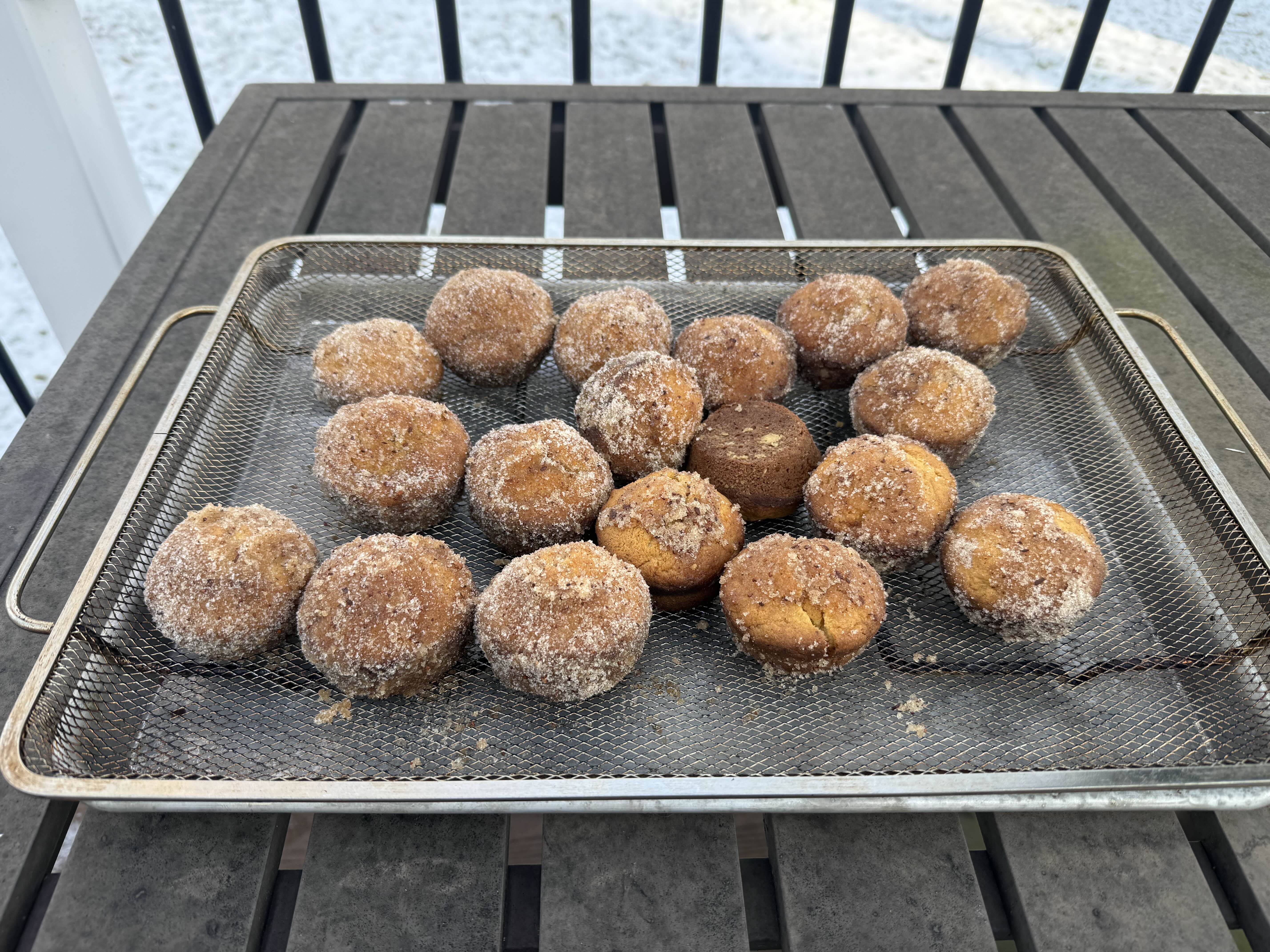 Dirt bombs on a wire rack.
